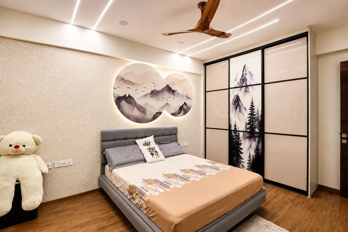 Decotales bedroom with illustrated sliding wardrobes and layered lighting